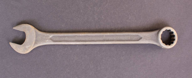 istock wrench on gray background, top view. Plumber tools 1449391503