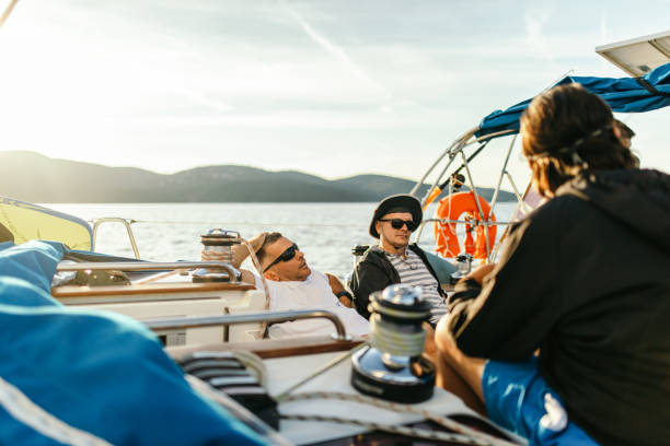 istock Group of men sailing on a sailboat 1449392960