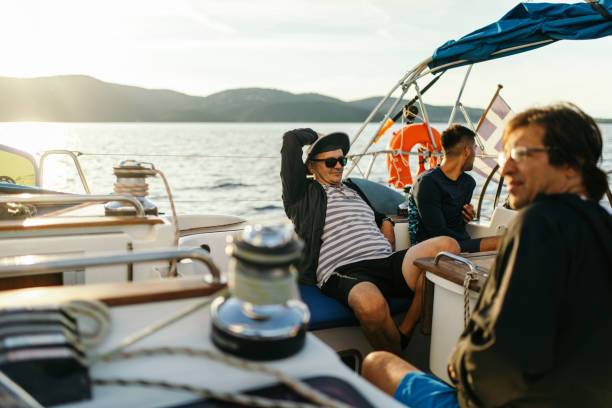 istock Group of men sailing on a sailboat 1449392965