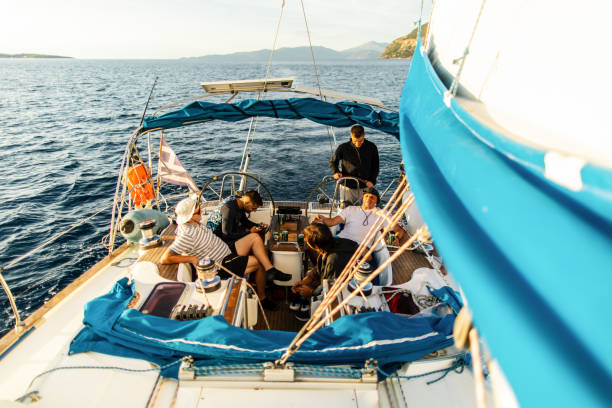istock Group of men sailing on a sailboat 1449393006