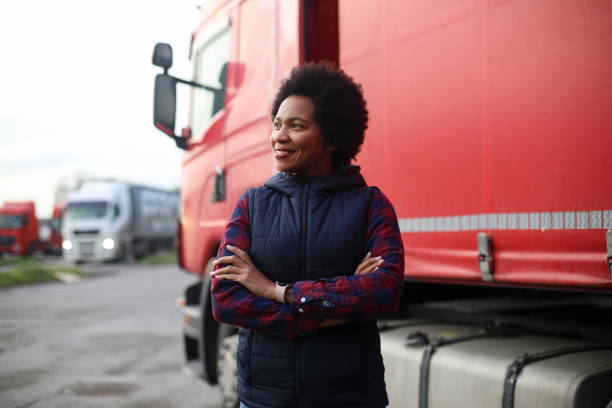 istock Truck driver posing with crossed arms 1449393154