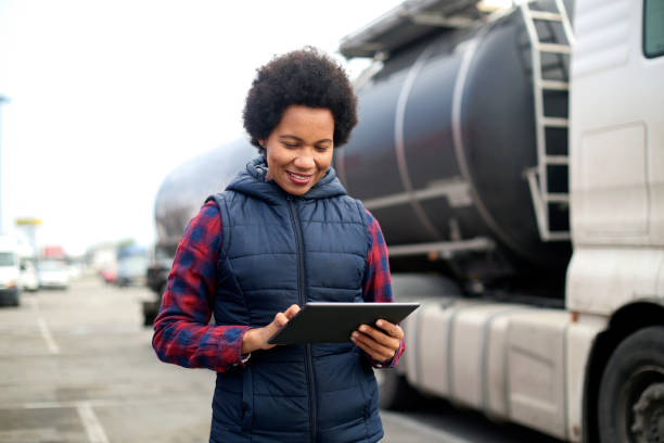 istock Female fuel truck driver 1449393340