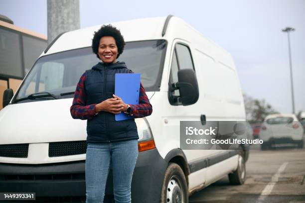 Van Driver Stock Photo - Download Image Now - Delivery Person, Van - Vehicle, Parking Lot