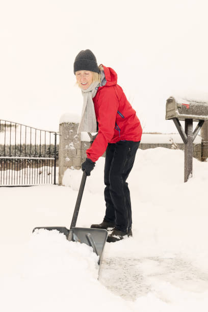 istock Snow clearing from driveway 1449394771