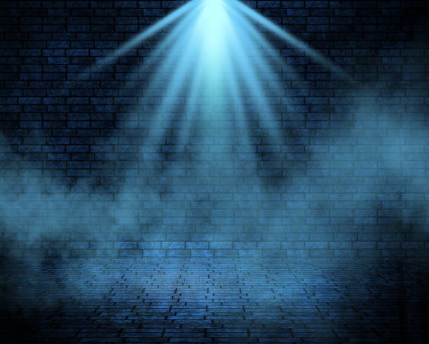 istock 3D dark grunge smoky interior with spotlight 1449396449