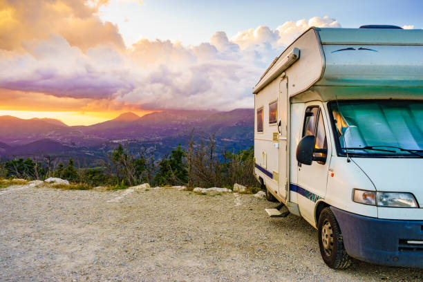 istock Rv camper in mountains at sunset, France. 1449398756
