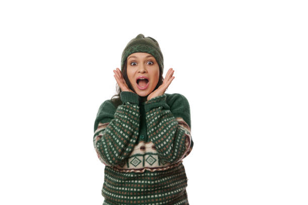 istock Surprised woman expressing stupefaction, astonishment and surprise, looking at camera with open mouth, isolated on white 1449401525