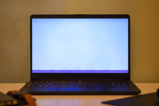 istock Laptop screen on desk in office, copyspace 1449402128