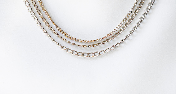 Close up of chain on white background. This file is cleaned, retouched and contains 