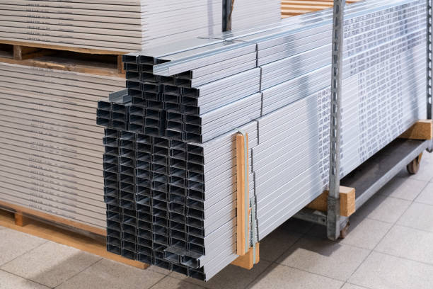 istock Stack of Building Material Aluminum Profile For Drywall At The Construction Work Site. For construction support  frame for plasterboard, gypsum board, plasterboard fastening 1449405578