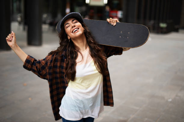 istock Happy smiling woman having fun outdoors 1449408113