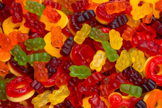 istock Assorted colorful gummy candies. Jelly donuts. Jelly bears. 1449408528