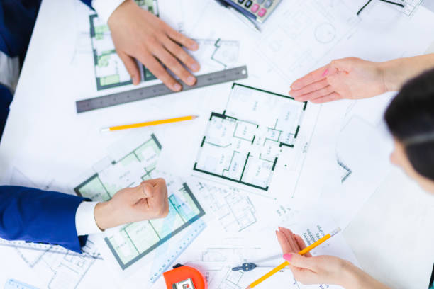 istock Close up photo of hands working with papers at office. 1449410187