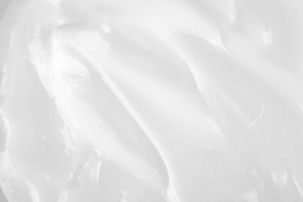 istock Texture of white cosmetic cream. 1449410605