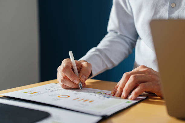 istock An Anonymous Businessman Working At Home 1449412217