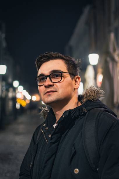 istock Caucasian guy from Romania in an illuminated street 1449413405