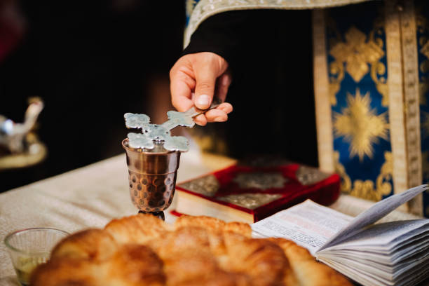 Divine Liturgy. Christian ritual. Divine Liturgy. Christian ritual. Priest during lituurgy close up photo. orthodox church stock pictures, royalty-free photos & images