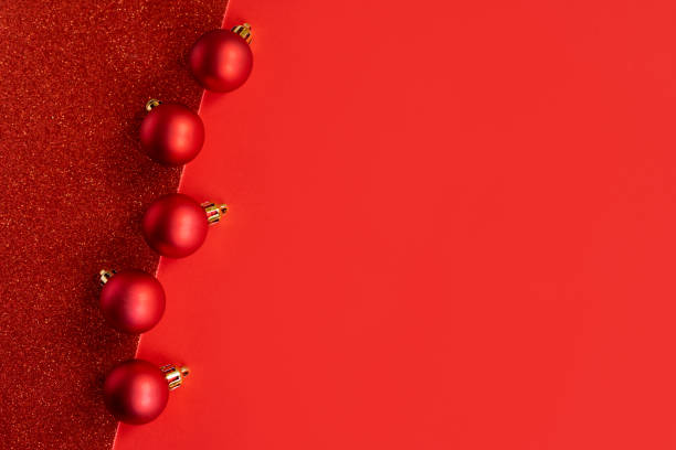 istock Beautiful Christmas ornaments on a bright red background. 1449424574