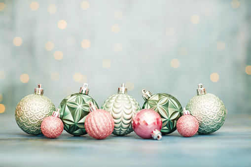Christmas background with pastel colored Christmas ornaments and copy space