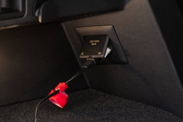 istock 230v power outlet socket in the car. Opened sockets. 1449425389