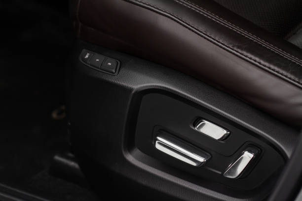 istock Electric car seat adjustment control panel close up view. Adjustable car seat position. Car interior. 1449426200