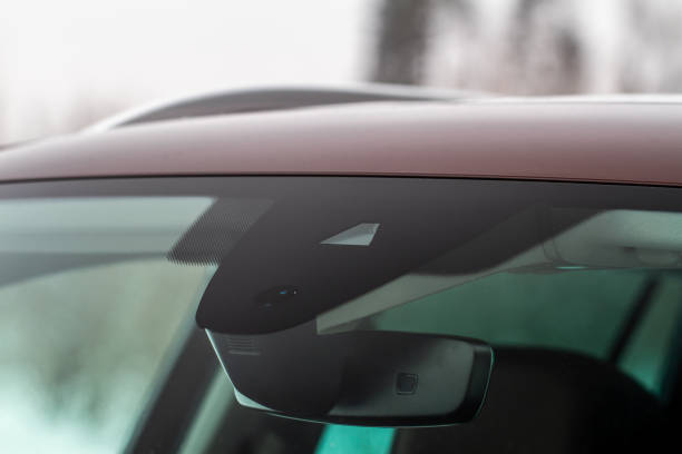istock Windshield rain and light sensors of modern car. Car rain sensor. 1449426452
