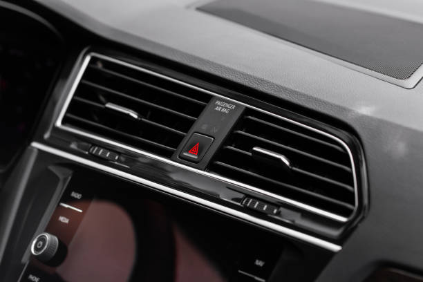 istock Emergency button in car, hazard light. Close up of car emergency button 1449426986