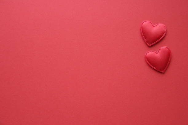 istock Red heart on a red background. Place for text. Valentine. 1449428357