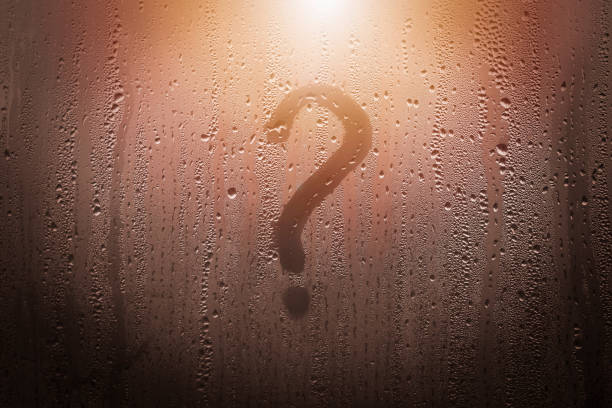 istock a question mark on a fogged window, a question mark drawn on a window with a finger 1449428529