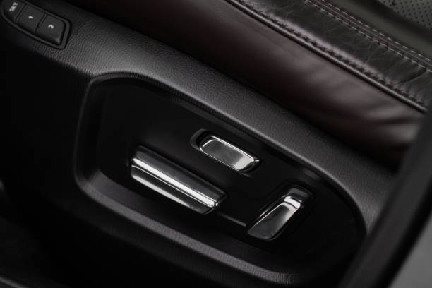 istock Electric car seat adjustment control panel close up view. Adjustable car seat position. Car interior. 1449429788