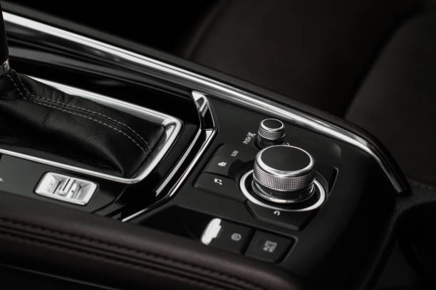 istock Car media controller close up. Modern car media and navigation control buttons 1449429803