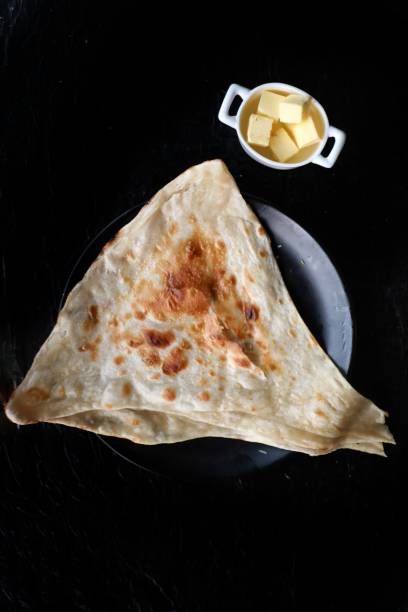 istock Butter naan with blocks of butter 1449429920