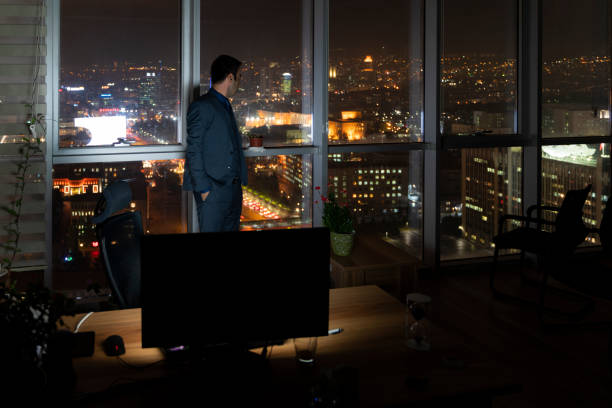 istock image of clerk in the office who is on the evening shift 1449430827