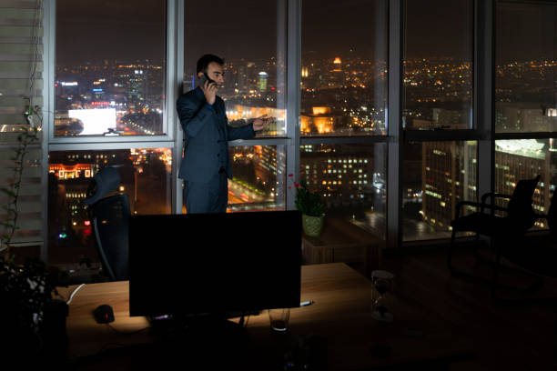 istock image of clerk in the office who is on the evening shift 1449430898