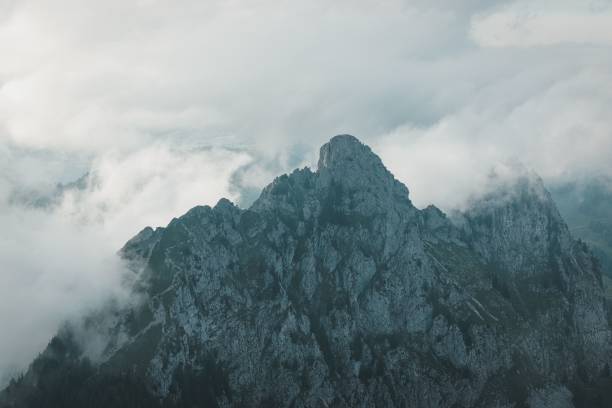 istock Drone shot of a mountain and cloudy sky 1449432241