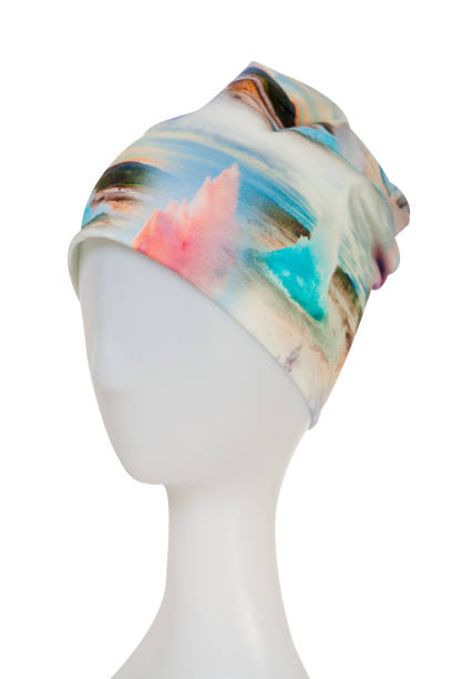 istock Stylish hat with abstract print on a mannequin. Isolated on white background 1449432312