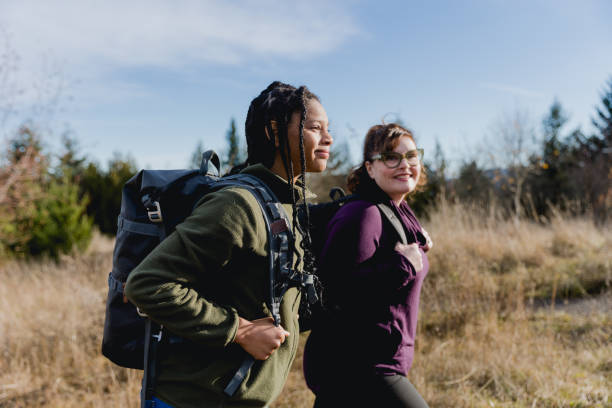 istock Multi Racial Mom and Daughter Winter Hike Together 1449432998