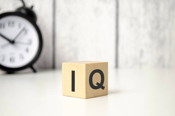 istock Wooden cubes with abbreviation IQ on table. Space for text 1449434297