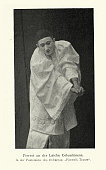 istock Comic acter dressed as Pierrot, a stock character of pantomime and commedia dell'arte 1449437761