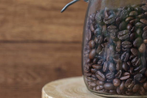 istock Coffee beans preserved in a glass bottle. 1449437830