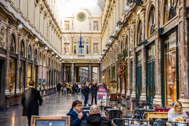 Galeries Royales Saint Hubert with many shoppers stock photo