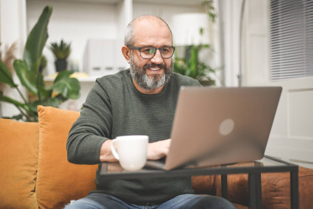 istock Mature man working from home 1449438167