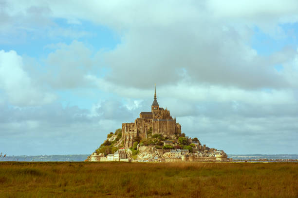 View of Mont Saint Michel in the distance on a cloudy day
