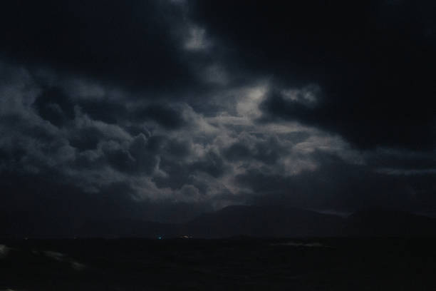 View at sea from passenger cruise ferry boat, during a dark moody winter day