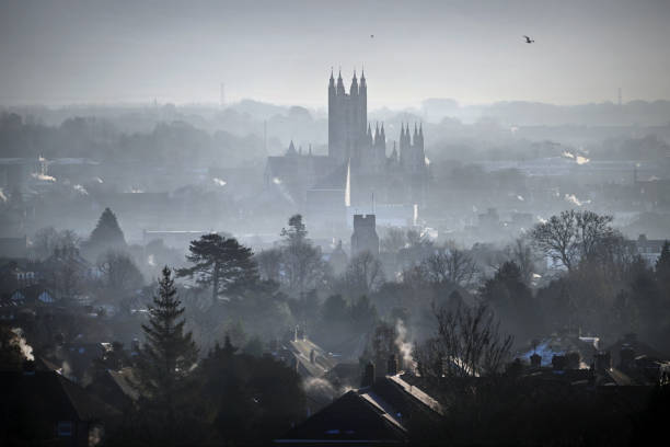 A frosty mid winter dawn over the ancient cathedral and city of Canterbury.\nCanterbury Cathedral in Canterbury, Kent, is one of the oldest and most famous Christian structures in England. It forms part of a World Heritage Site. It is the cathedral of the Archbishop of Canterbury, leader of the Church of England and symbolic leader of the worldwide Anglican Communion