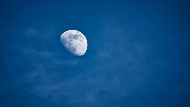 istock close up full moon passing by over sky, time lapse 1449449945