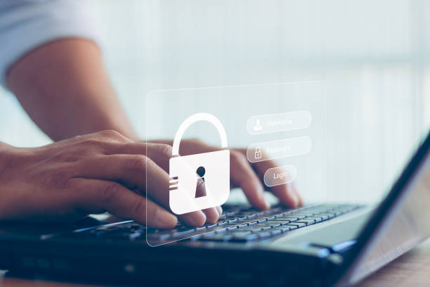 istock Cyber security concept, data protection, and secured internet access. Man hand typing on a laptop computer keyboard with login and password on virtual screen display. cybersecurity, cyberspace. 1449449969