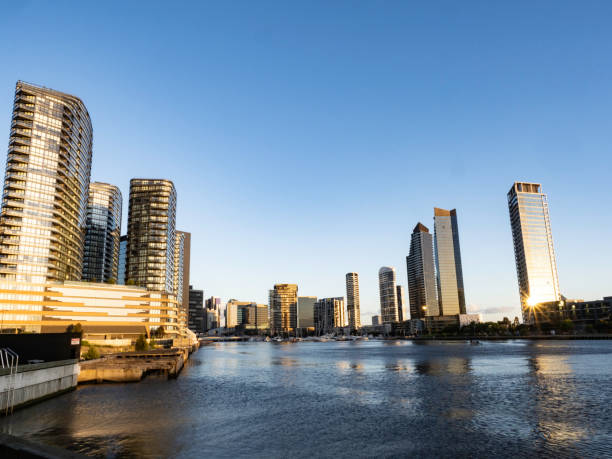 istock Urban skyline from river at sunset 1449451703