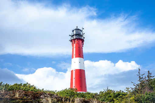 lighthouse of Hoernum on Sylt island, Germany. Landmark, tourist attraction and guiding light for navigation on the North Sea.
