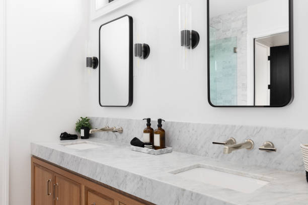 istock A cozy bathroom with a wood cabinet. 1449471401